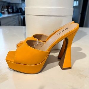 Orange platform heels